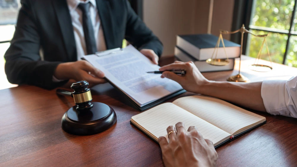judge consult or discussing contract papers